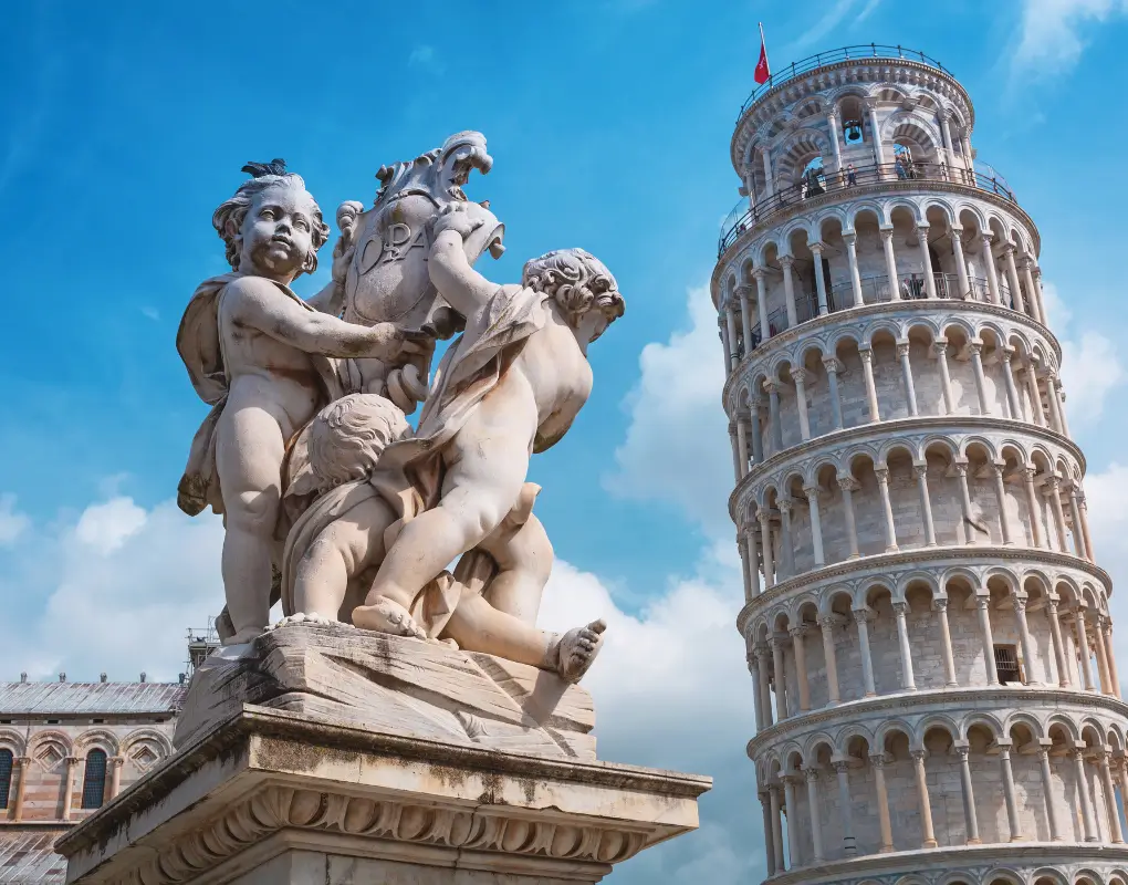 The Leaning Tower of Pisa and statue during a multigenerational cultural holiday in Italy.
