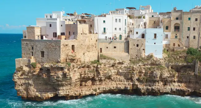 Celebrate a birthday in Polignano al Mare, Italy, with stunning coastal views and the town's unique charm for a memorable getaway.