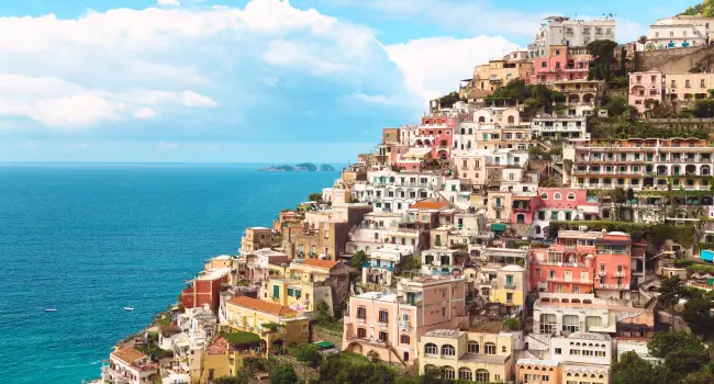 Colourful hillside view of Positano, a perfect honeymoon destination along the Amalfi Coast.
