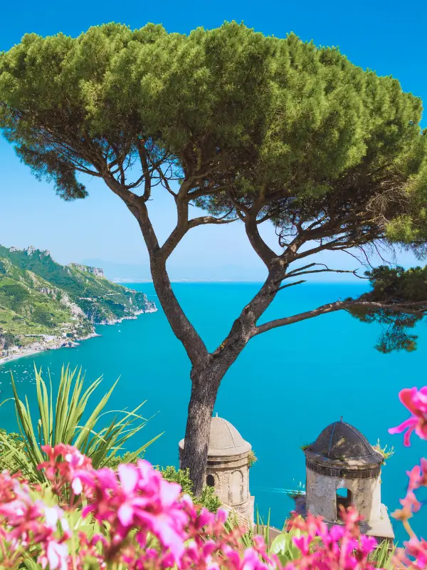 A view from Villa Rufolo's blooming gardens overlooking the Mediterranean in spring.