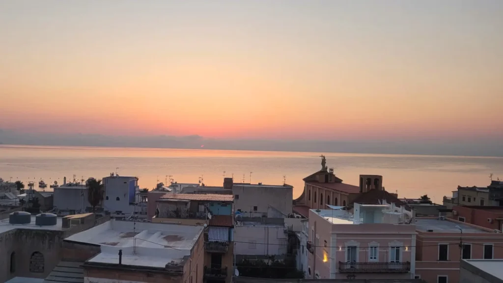 Sunrise over the rooftops and sea at Lipari in the Aeolian Islands
