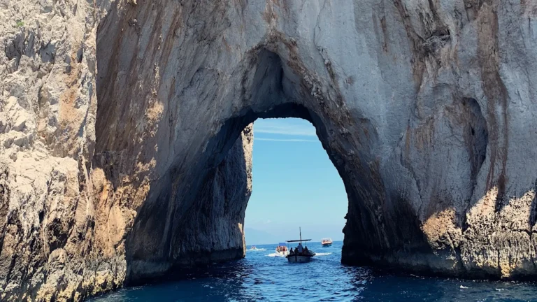 Luxury private boat tour in Capri near the Faraglioni rocks