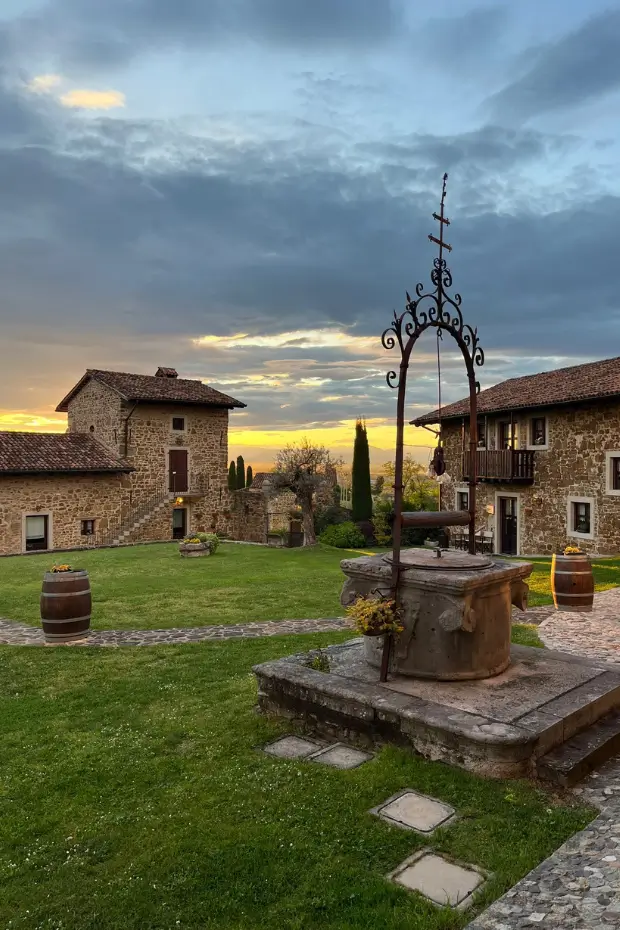 Rustic agriturismo courtyard in Friuli Venezia Giulia during a romantic anniversary stay in the Italian countryside