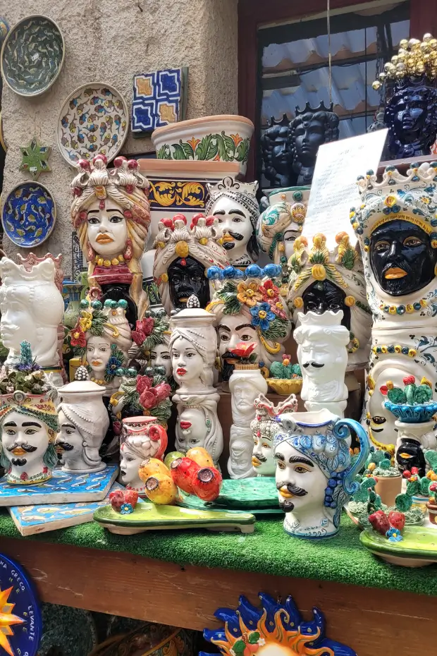 Colorful handmade Sicilian ceramic heads at a shop in Erice.