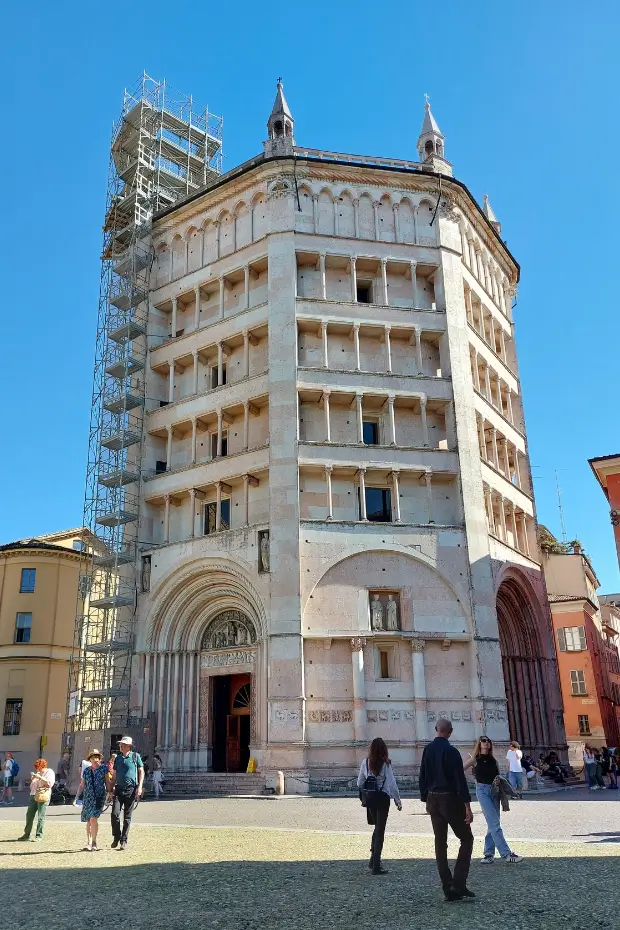 The pink marble Baptistery of Parma, a landmark for cultural travellers in Italy.