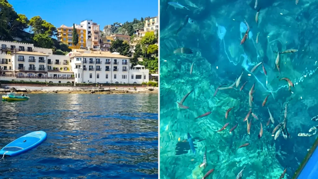 Belmond Villa Sant'Andrea seen from the sea in Taormina Mare Sicily, with a paddleboard in the foreground — a beachfront base for a family vacation in Sicily