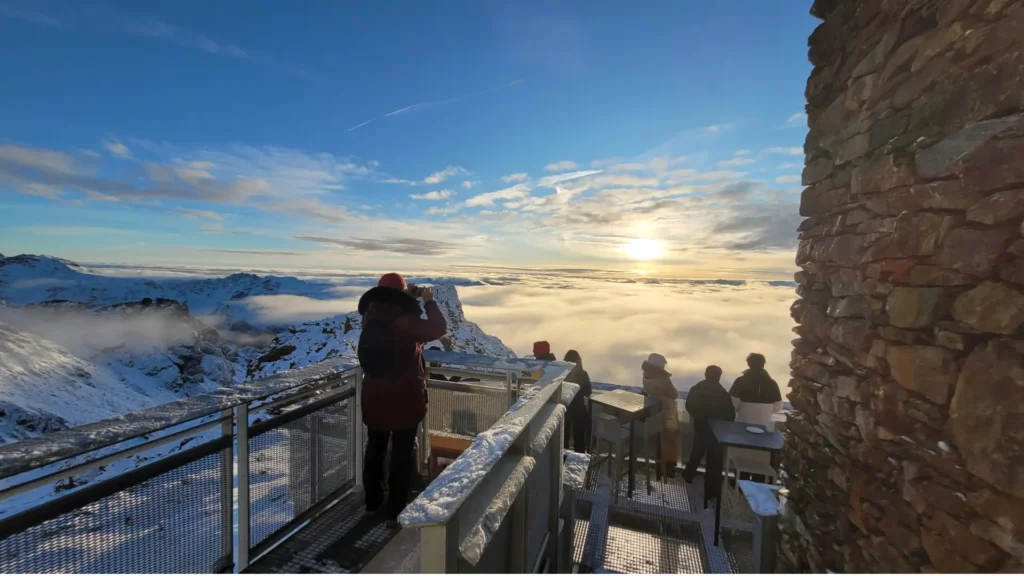 Dolomites winter family activities for non-skiers showcasing the breathtaking panoramic terrace view from Sass Pordo