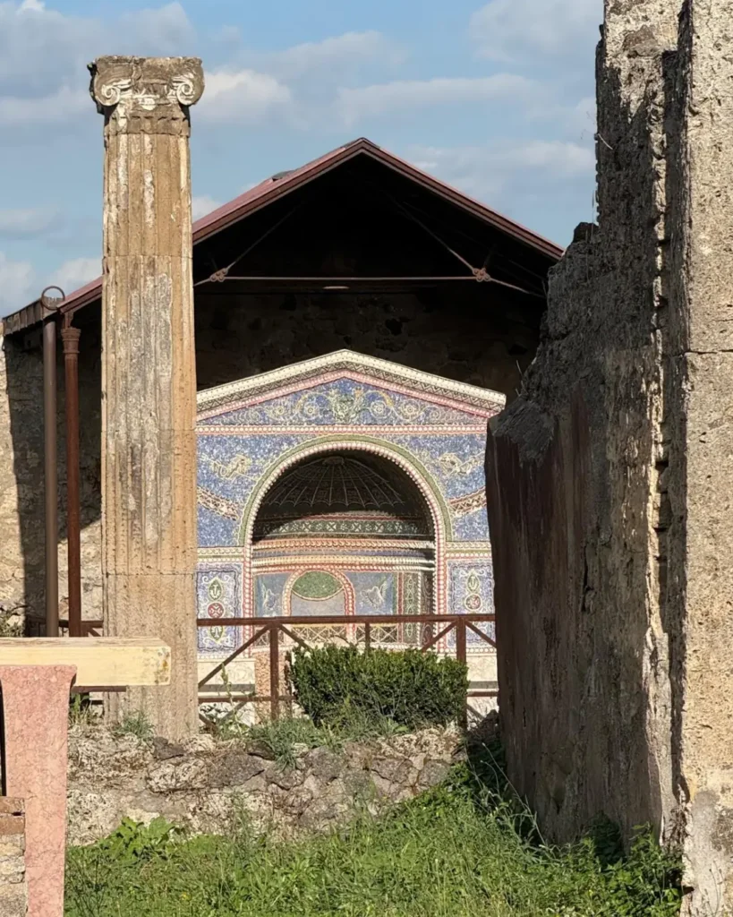 A mosaic shrine among the ruins at Pompeii